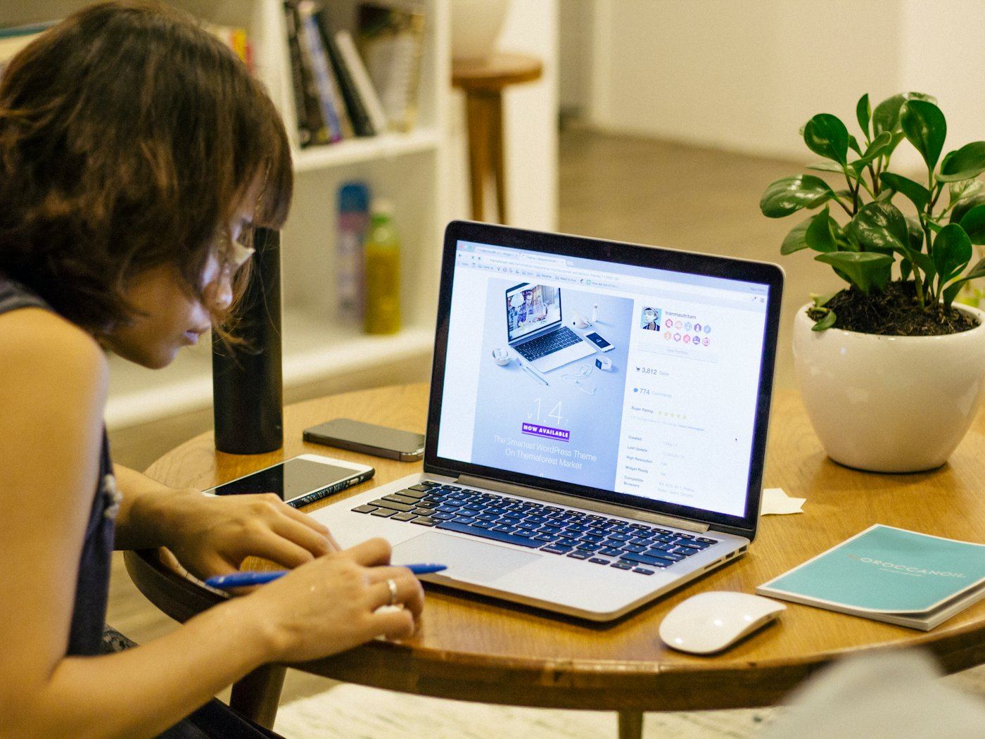 Laptop and notebook on a study desk
